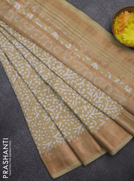Semi chanderi saree sandal and off white with allover batik prints and zari woven border