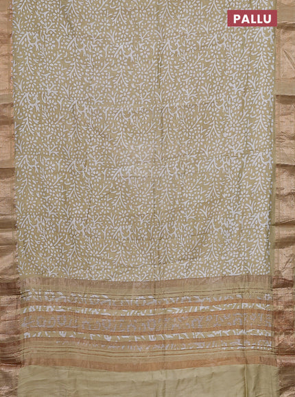 Semi chanderi saree sandal and off white with allover batik prints and zari woven border