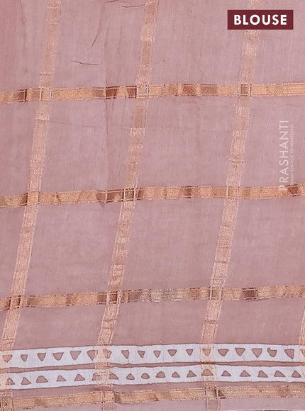 Semi chanderi saree peach shade and off white with allover zari checks & batik butta prints and printed border
