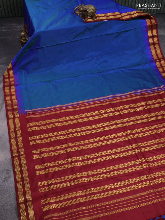 10 yards silk saree dual shade of cs blue and maroon with plain body and temple design zari woven border
