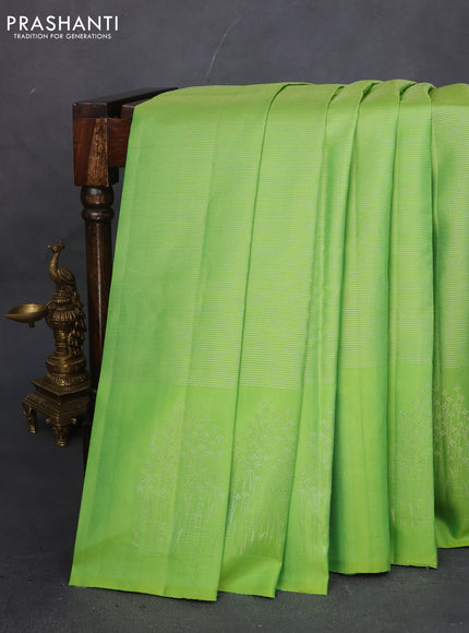 Pure soft silk saree light green and deep purple with allover silver zari weaves and silver zari woven butta border