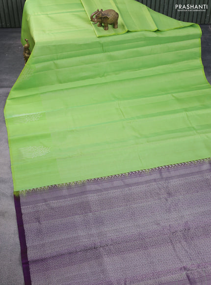 Pure soft silk saree light green and deep purple with allover silver zari weaves and silver zari woven butta border