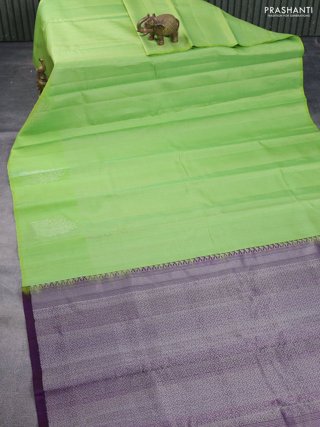 Pure soft silk saree light green and deep purple with allover silver zari weaves and silver zari woven butta border