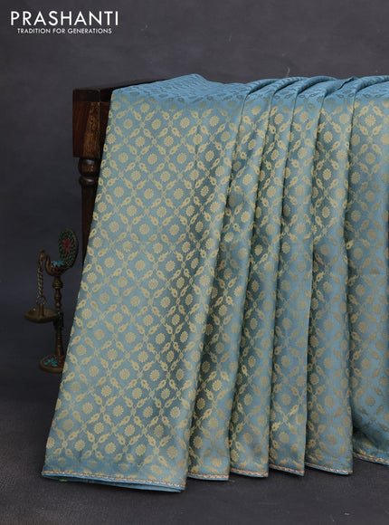 Banarasi semi crepe saree pastel blue with allover zari woven brocade weaves and lace work border