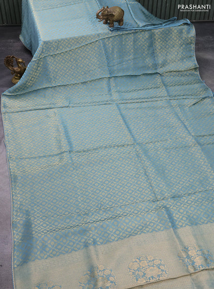 Banarasi semi crepe saree pastel blue with allover zari woven brocade weaves and lace work border