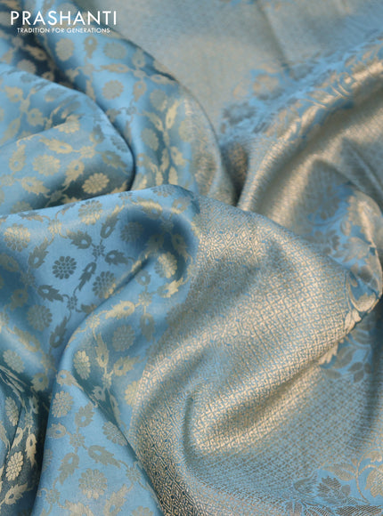 Banarasi semi crepe saree pastel blue with allover zari woven brocade weaves and lace work border