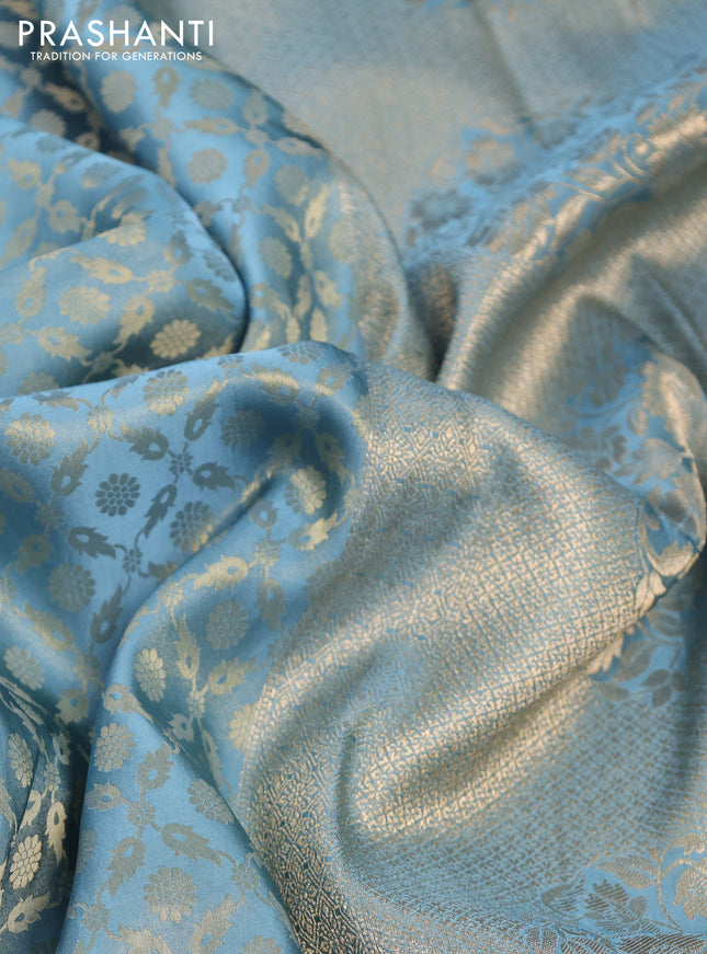 Banarasi semi crepe saree pastel blue with allover zari woven brocade weaves and lace work border