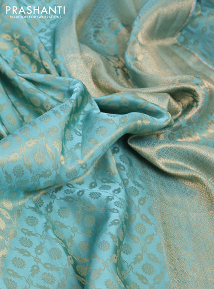 Banarasi semi crepe saree teal blue shade with allover zari woven brocade weaves and lace work border