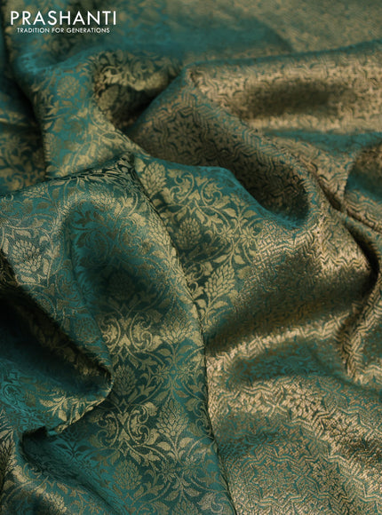 Banarasi semi crepe saree green with allover zari woven brocade weaves and lace work border