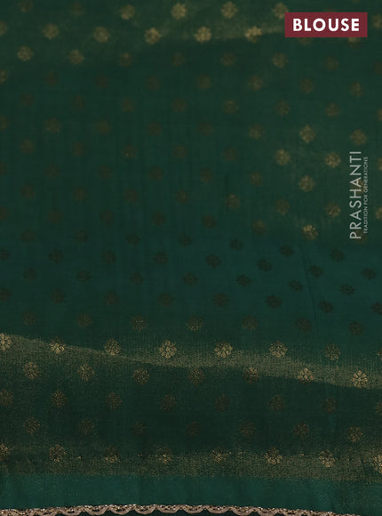 Banarasi semi crepe saree green with allover zari woven brocade weaves and lace work border