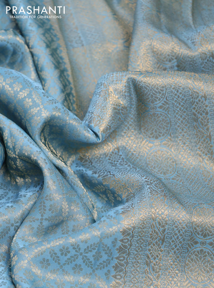 Banarasi semi crepe saree light blue with allover zari woven brocade weaves and lace work border