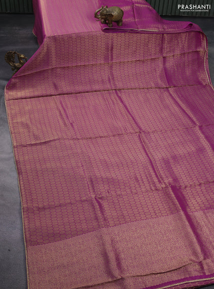 Banarasi semi crepe saree purple with allover zari woven brocade weaves and lace work border