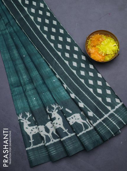 Semi tussar saree green shade with allover mirror work and printed border