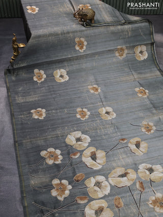 Semi tussar saree military green with floral prints and simple zari border