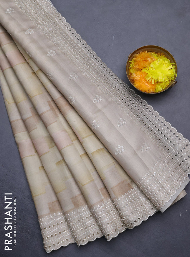 Semi tussar saree pale yellow and beige with allover geometric prints and embroidery cut work border