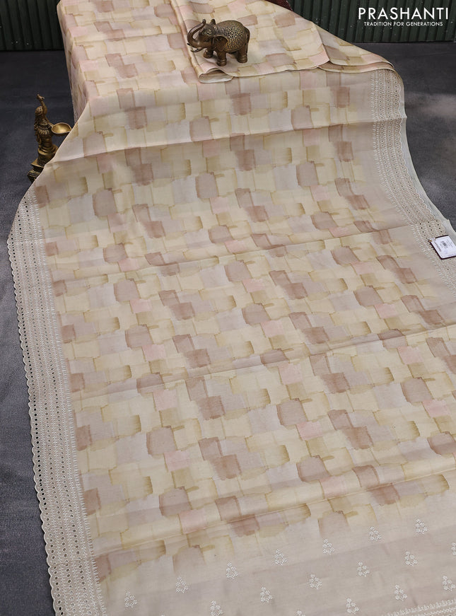Semi tussar saree pale yellow and beige with allover geometric prints and embroidery cut work border