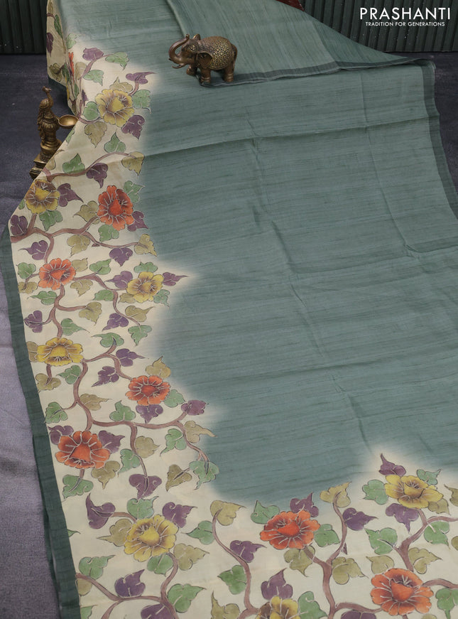 Semi tussar saree sap green shade and cream with plain body and kalamkari prints & pita work border