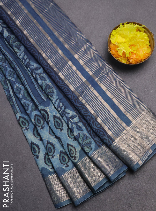 Semi chanderi saree indigo blue with allover vanaspathi prints and zari woven border