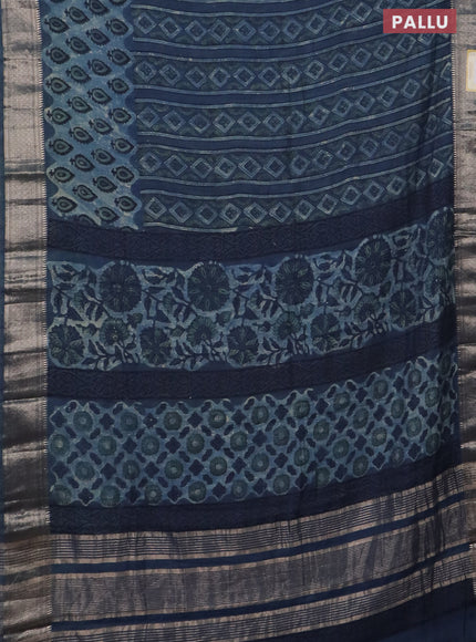 Semi chanderi saree indigo blue with allover vanaspathi prints and zari woven border
