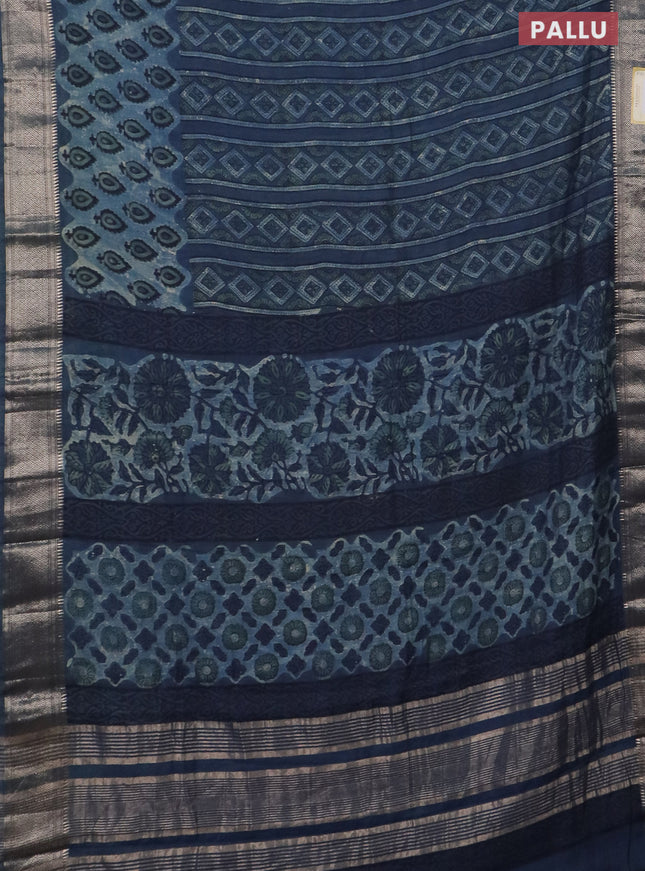 Semi chanderi saree indigo blue with allover vanaspathi prints and zari woven border
