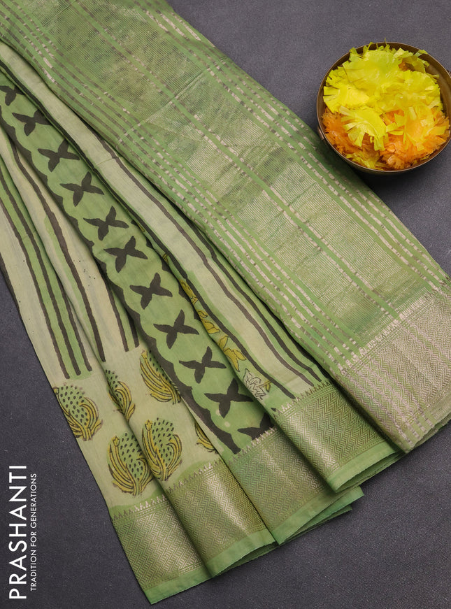 Semi chanderi saree pista green with allover stripes pattern and zari woven border