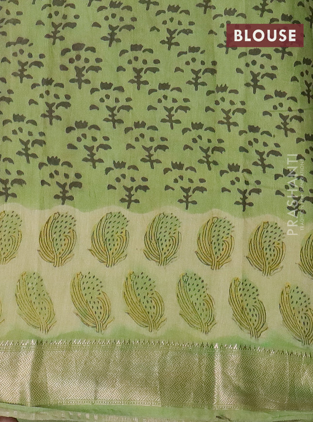 Semi chanderi saree pista green with allover stripes pattern and zari woven border