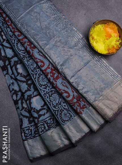 Semi chanderi saree pastel green and black with allover vanaspathi prints and zari woven border