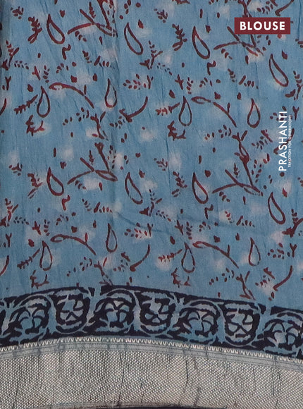 Semi chanderi saree pastel green and black with allover vanaspathi prints and zari woven border