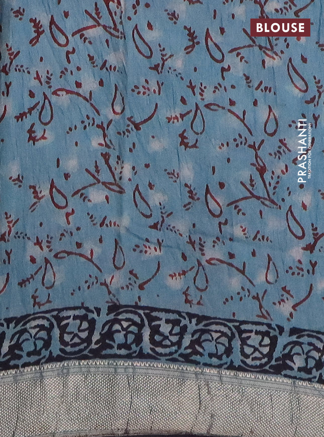 Semi chanderi saree pastel green and black with allover vanaspathi prints and zari woven border