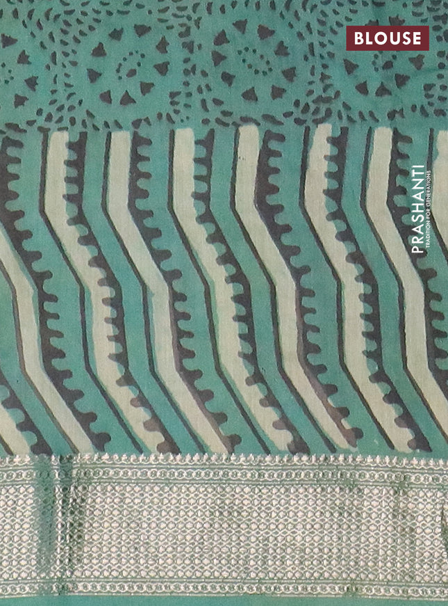 Semi chanderi saree pista green and teal shade with allover vanaspathi prints and zari woven border