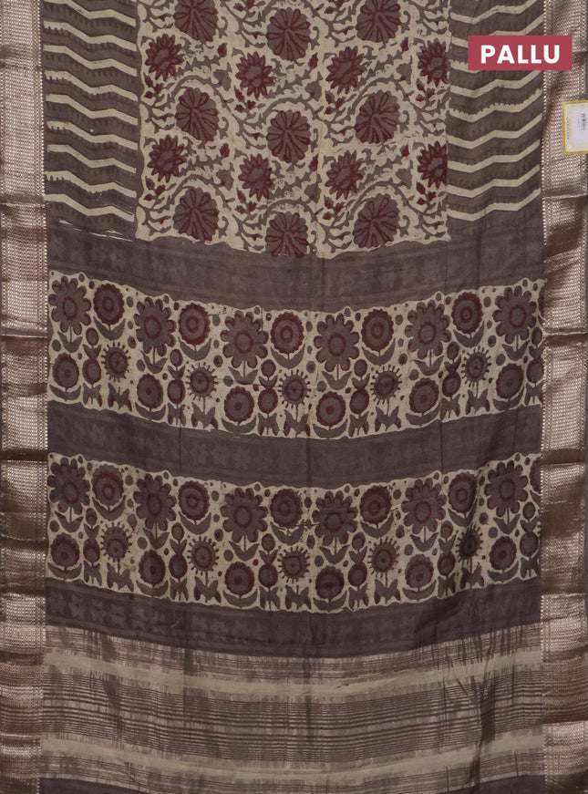 Semi chanderi saree beige and grey shade with allover vanaspathi prints and zari woven border