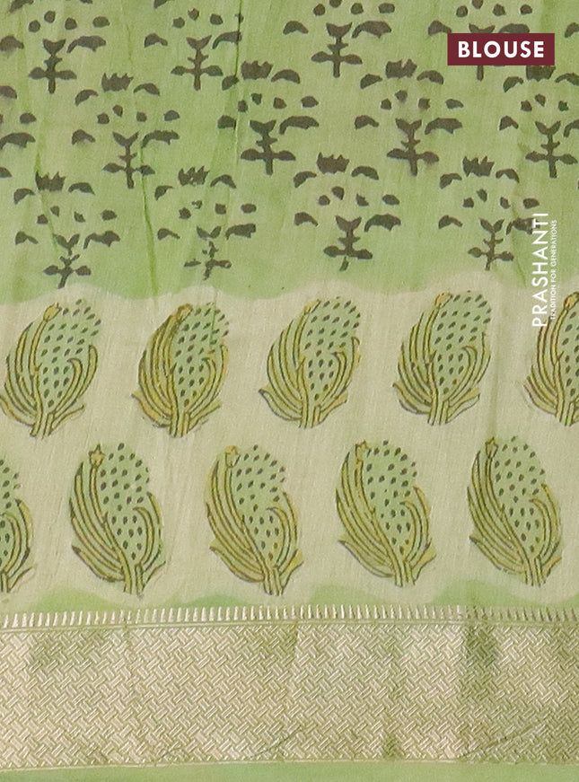 Semi chanderi saree pista green and light green with allover stripes pattern and zari woven border