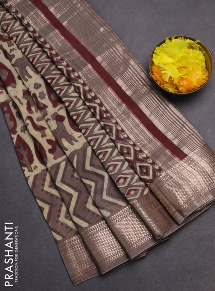 Semi chanderi saree beige and brown shade with allover vanaspathi prints and zari woven border