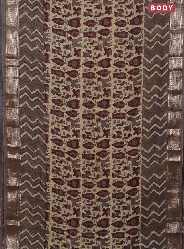 Semi chanderi saree beige and brown shade with allover vanaspathi prints and zari woven border