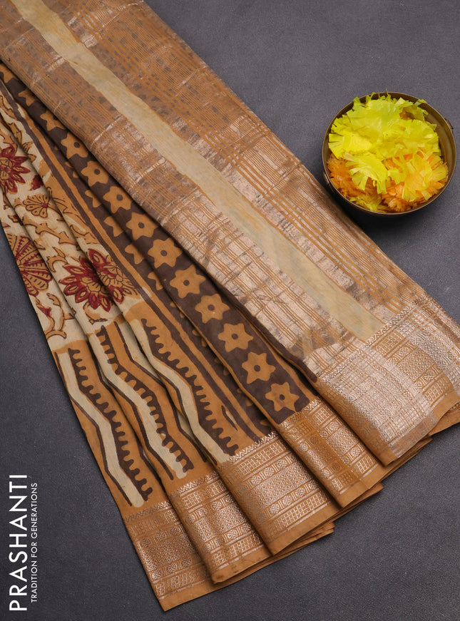 Semi chanderi saree sandal and dark mustard with allover vanaspathi prints and zari woven border