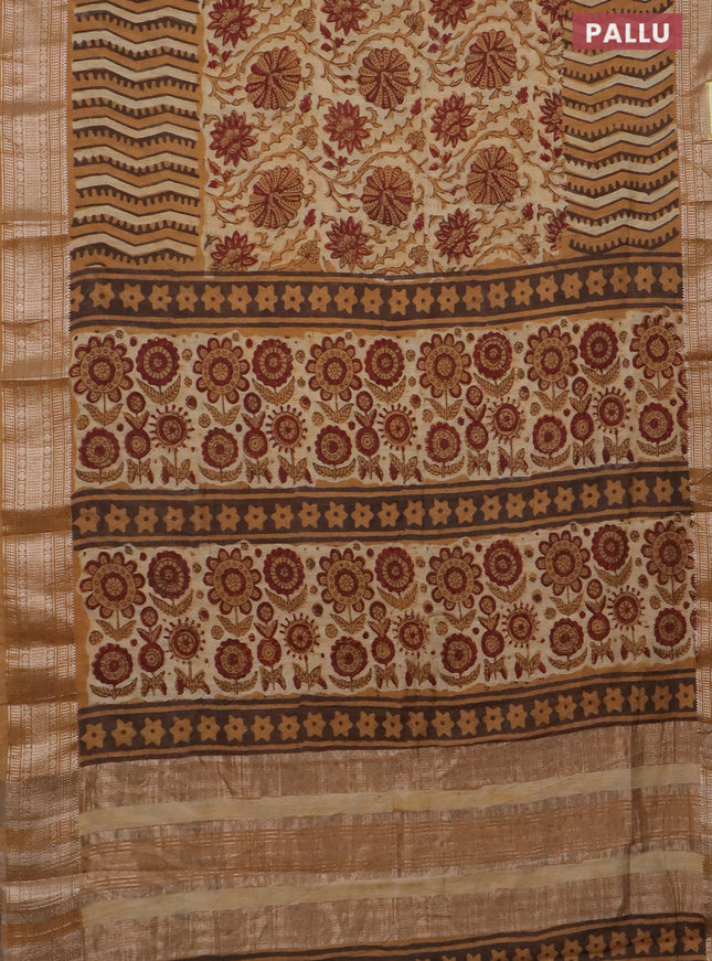 Semi chanderi saree sandal and dark mustard with allover vanaspathi prints and zari woven border