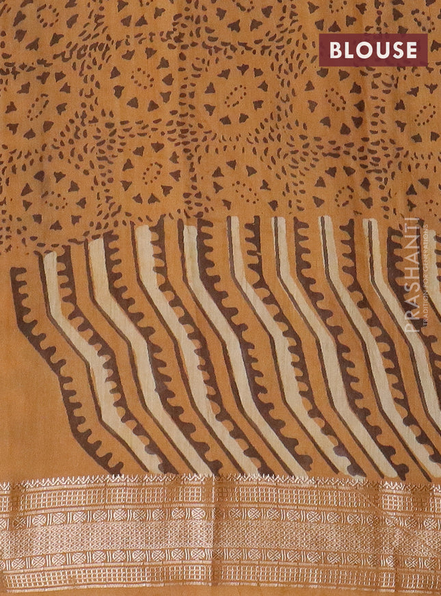 Semi chanderi saree sandal and dark mustard with allover vanaspathi prints and zari woven border