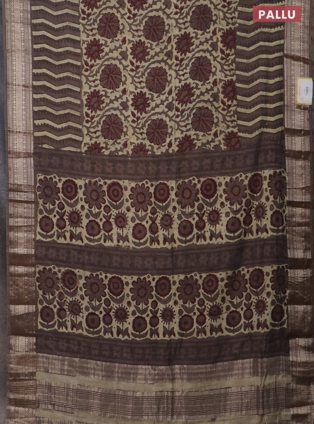 Semi chanderi saree beige and brown shade with allover vanaspathi prints and zari woven border