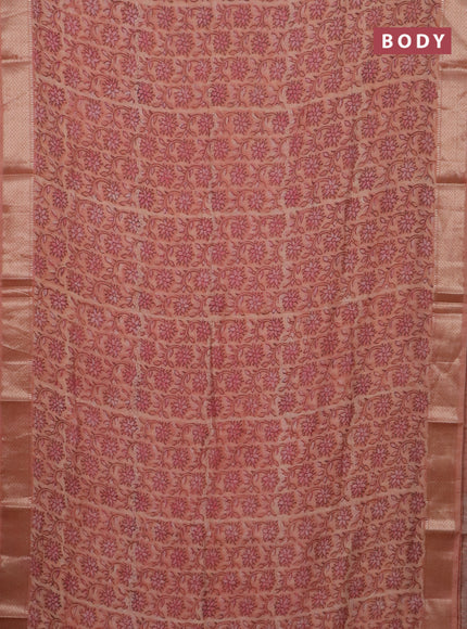 Semi chanderi saree peach orange with allover vanaspathi prints and zari woven border