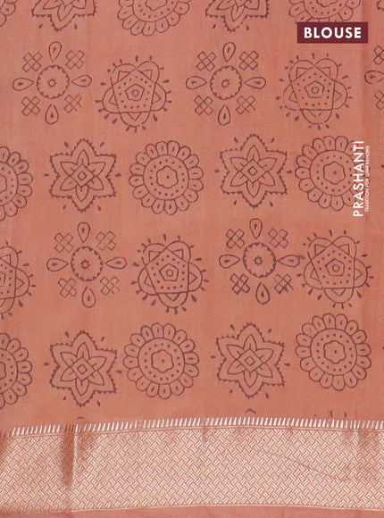 Semi chanderi saree peach orange with allover vanaspathi prints and zari woven border