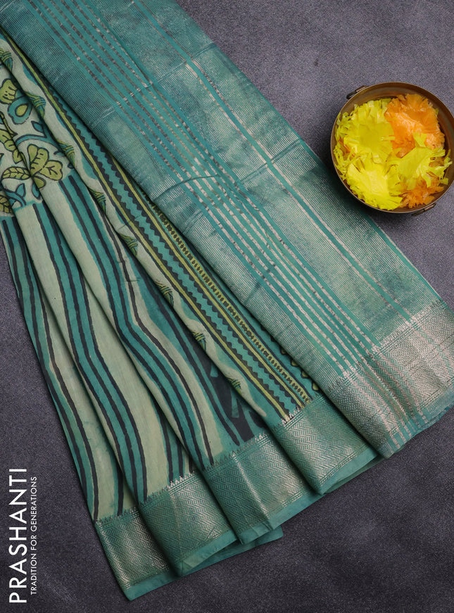 Semi chanderi saree pista green and teal shade with allover vanaspathi prints and zari woven border