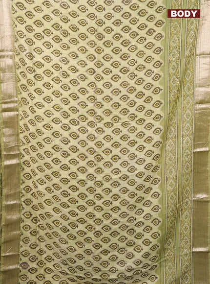 Semi chanderi saree pista green with allover vanaspathi prints and zari woven border