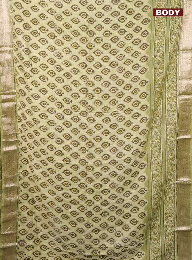 Semi chanderi saree pista green with allover vanaspathi prints and zari woven border