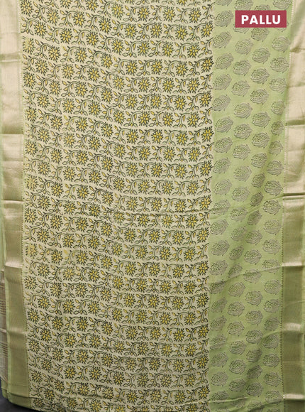 Semi chanderi saree pista green with allover vanaspathi prints and zari woven border