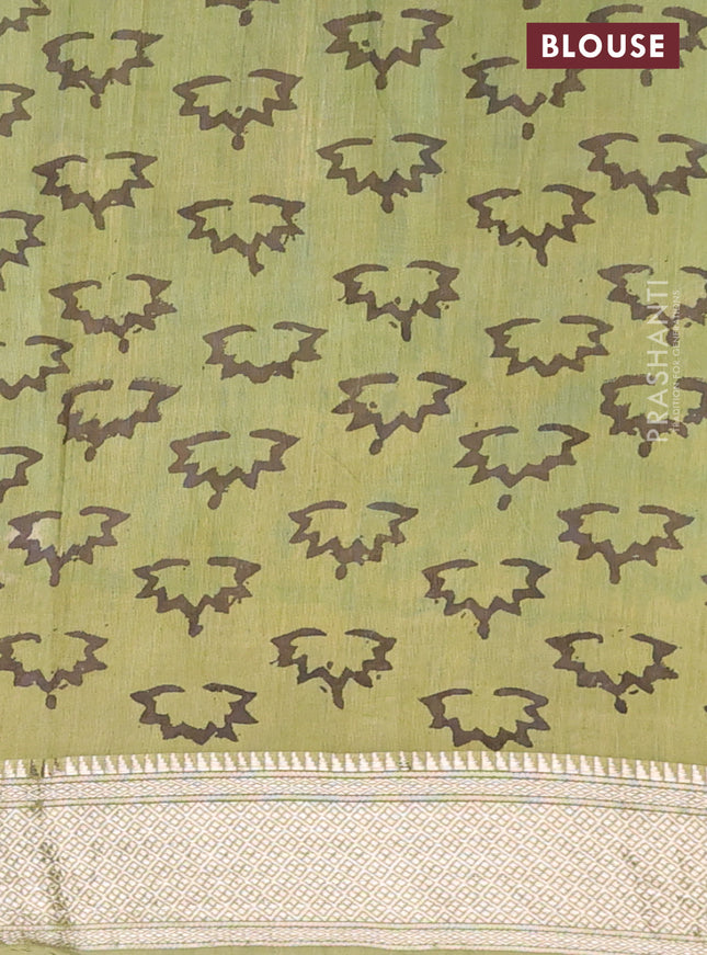 Semi chanderi saree pista green with allover vanaspathi prints and zari woven border