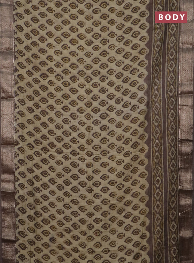 Semi chanderi saree beige and pastel brown with allover vanaspathi prints and zari woven border