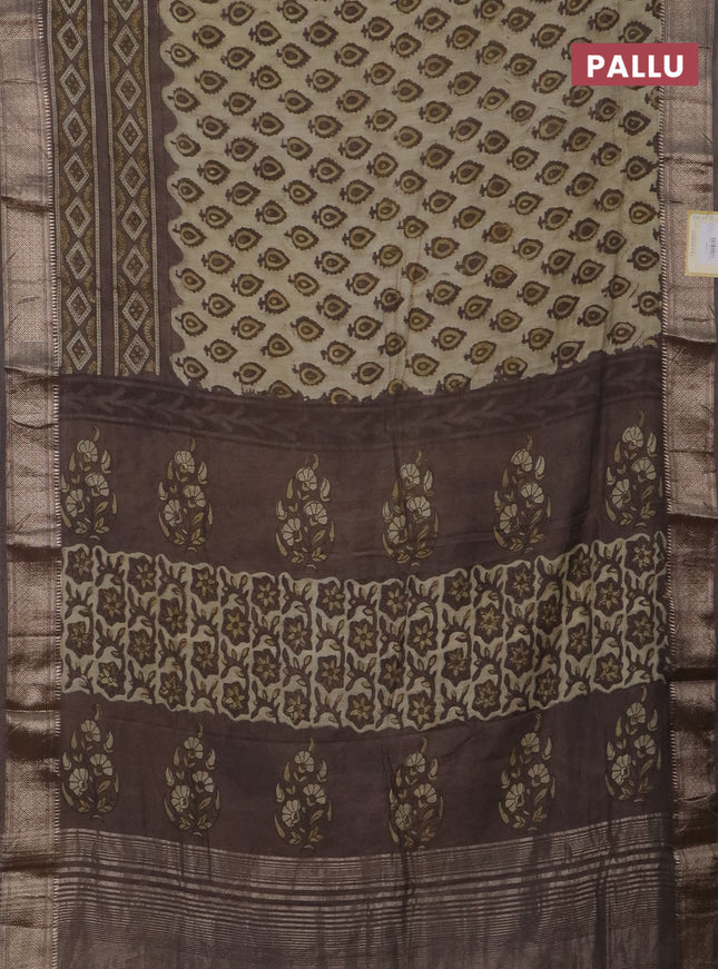 Semi chanderi saree beige and pastel brown with allover vanaspathi prints and zari woven border