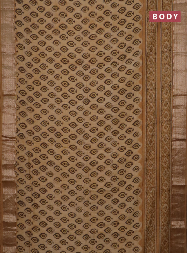 Semi chanderi saree sandal with allover vanaspathi prints and zari woven border