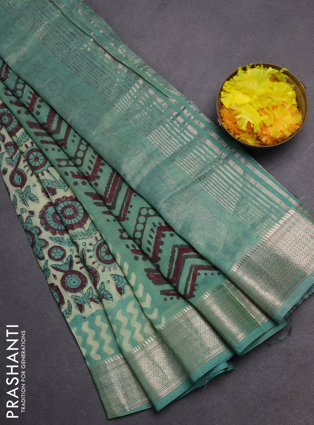 Semi chanderi saree pista green and teal green shade with allover vanaspathi prints and zari woven border