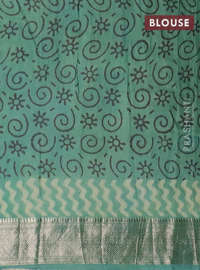 Semi chanderi saree pista green and teal green shade with allover vanaspathi prints and zari woven border